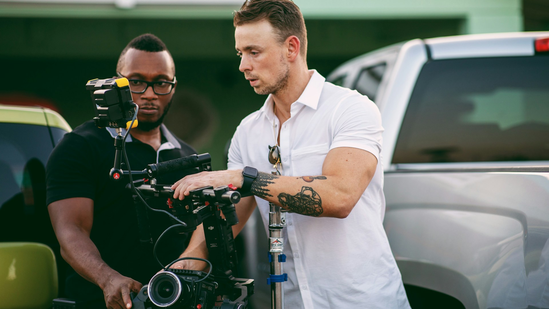Film director reviewing monitor on production set